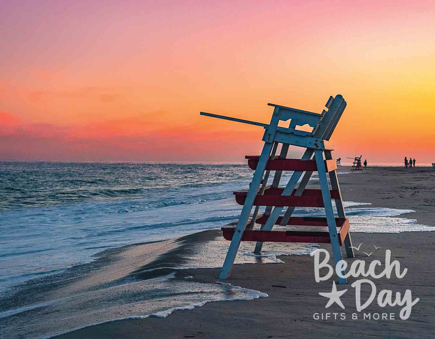 January: Lifeguard chair on Cape May beach beneath a colorful sunset